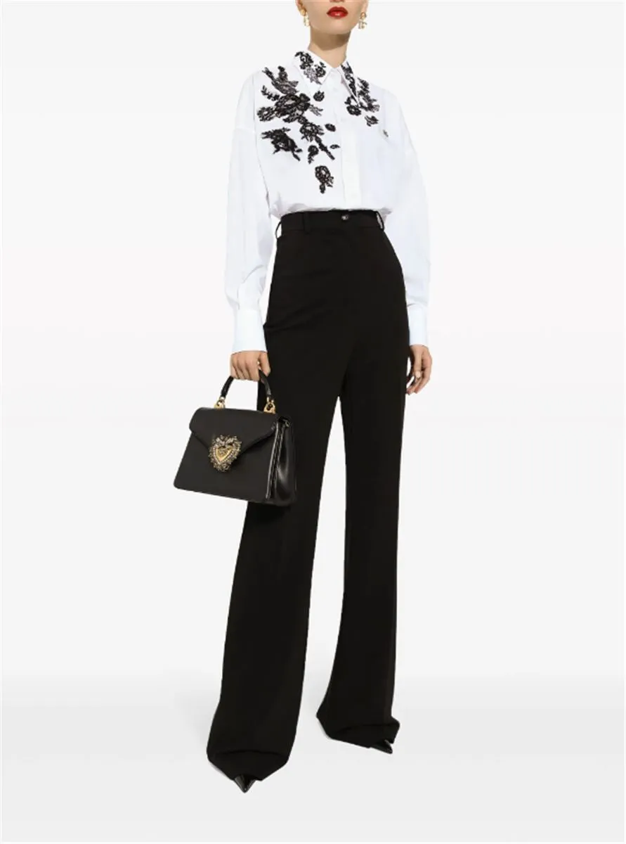 HIGH-WAISTED PRESSED-CREASE FLARED TROUSERS